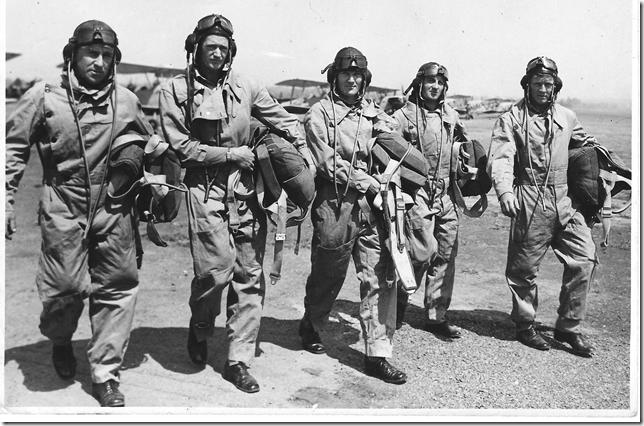 Cliff Kingsford-Smith, Jack Sandilands, Ted Williams, Ken Ross and Jack Steele at Archerfield airfield.